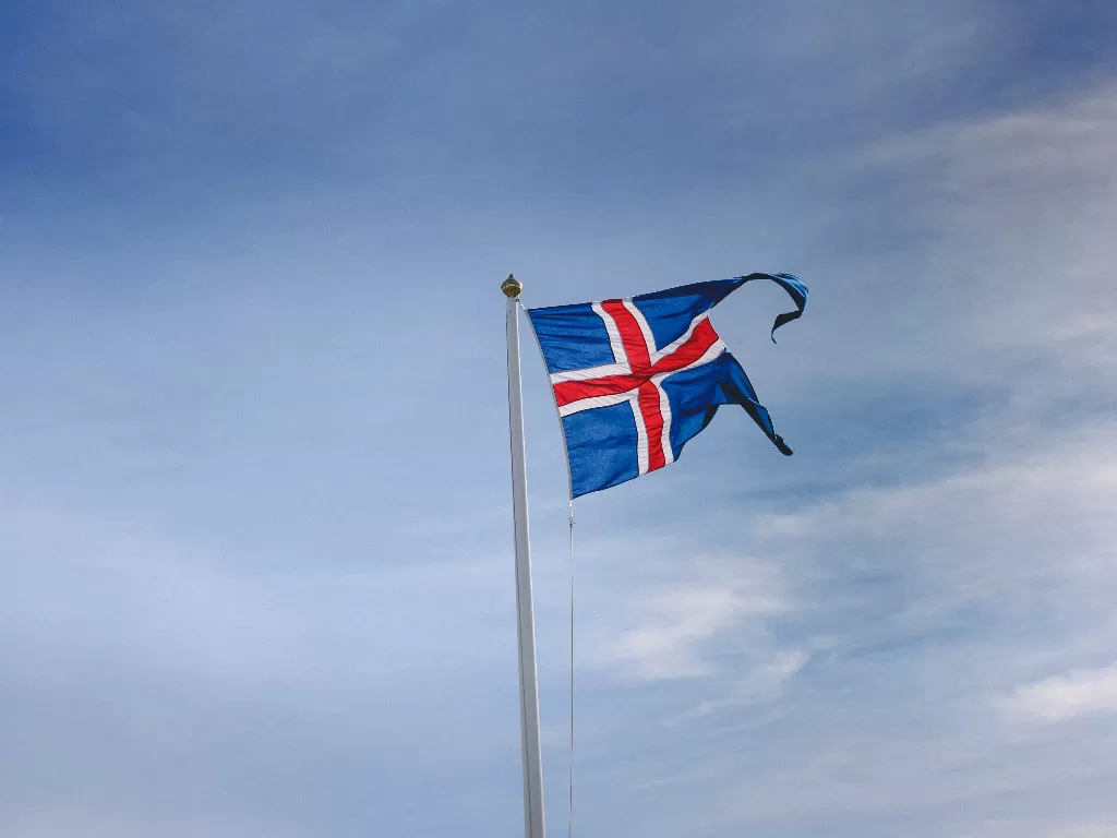 Bendera Islandia. (Unsplash/@marcosamaniego)