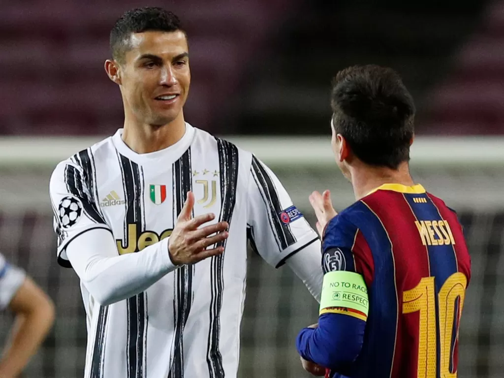 Cristiano Ronaldo dan Lionel Messi. (REUTERS/ALBERT GEA)