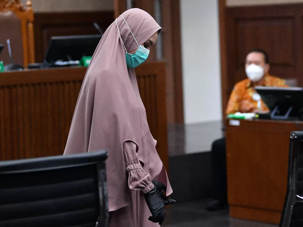 Jaksa Pinangki Sirna Malasari bersiap menjadi saksi dalam sidang lanjutan perkara dugaan suap kepada jaksa di Pengadilan Tipikor, Jakarta, Selasa (29/12/2020).  (photo/ ANTARA FOTO/Sigid Kurniawan)