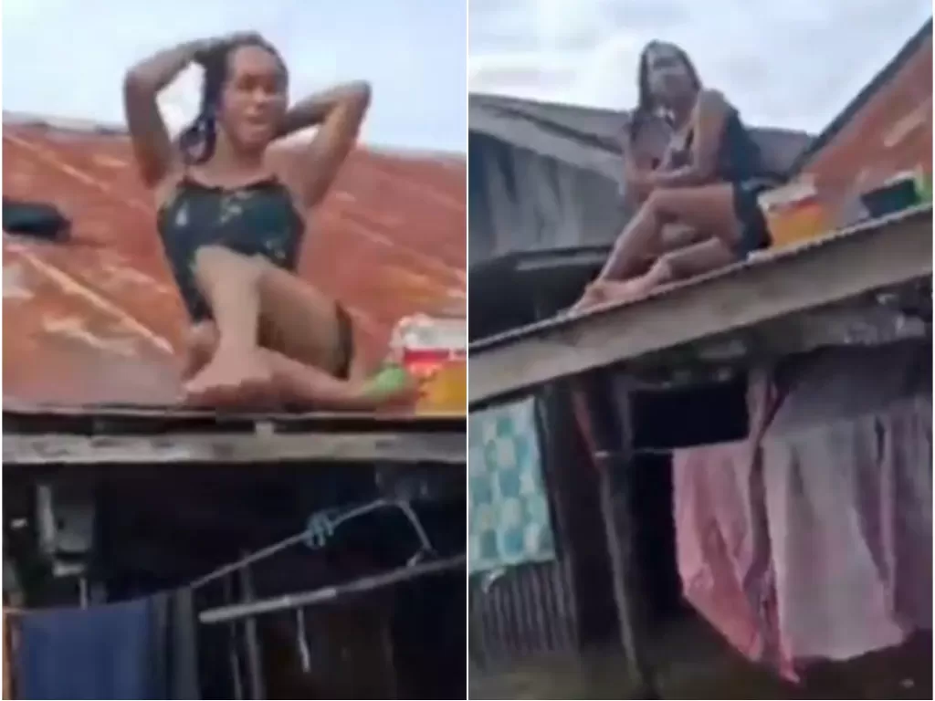 Waria sedang keramas di atap rumah yang dikelilingi banjir (Istimewa)