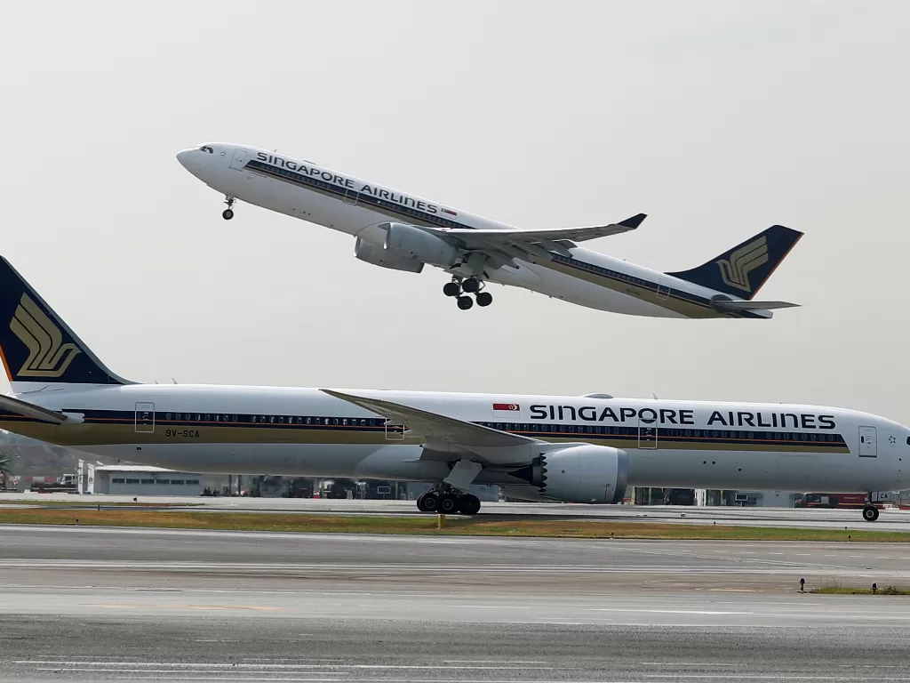 Pesawat maskapai Singapura. (REUTERS/Edgar Su)