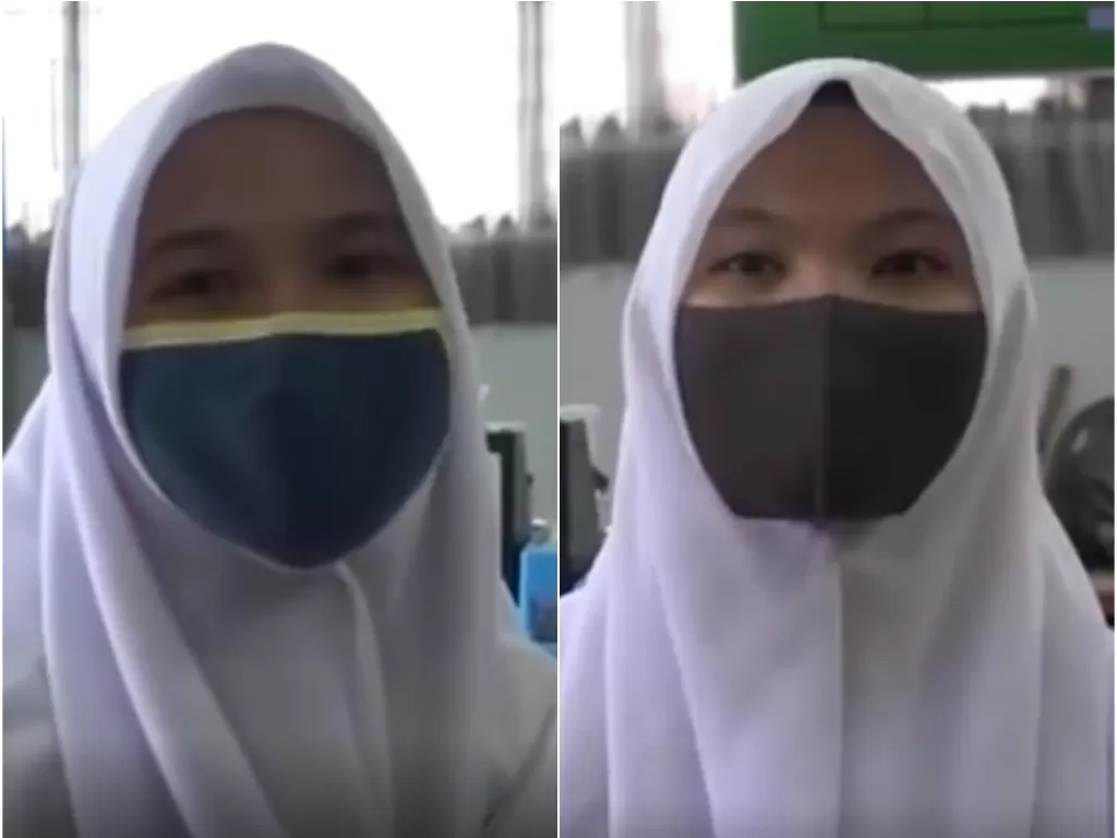 Engelia dan Eka, dua siswi non muslim di SMKN 2 Padang yang mengenakan Jilbab (Istimewa)