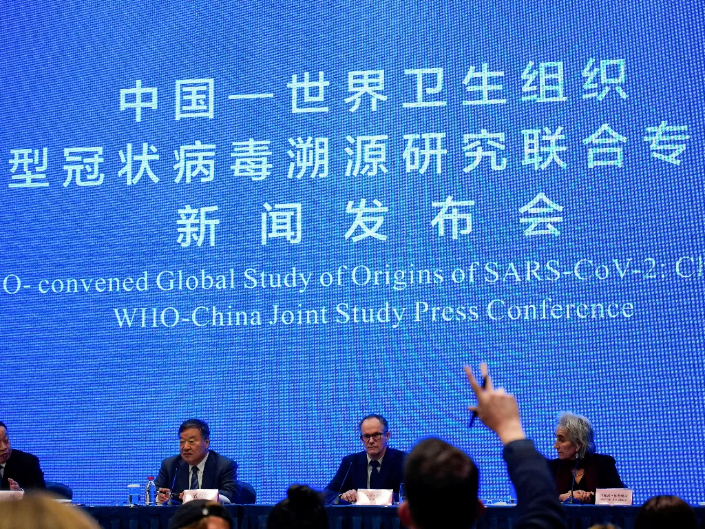 Pihak WHO saat menggelar pers mengenai virus COVID-19 di China. (photo/REUTERS/ALY SONG)