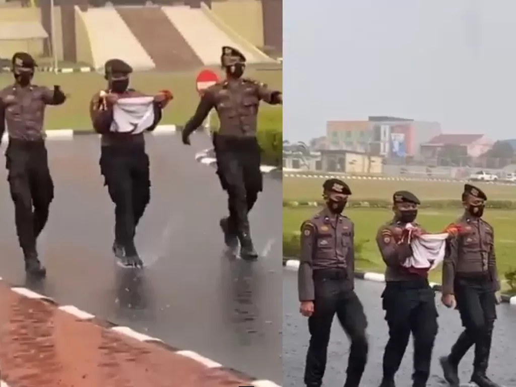 Polisi turunkan Bendera Merah Putih di tengah hujan badai (Instagram/lokerriau1official)