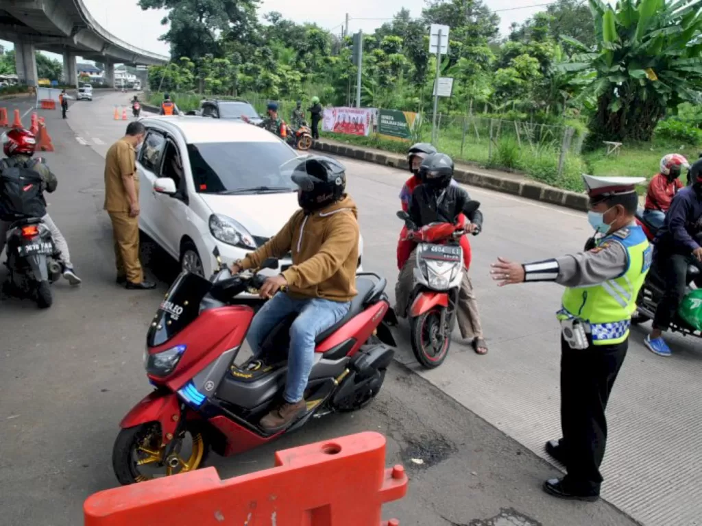 Ganjil genap di Kota Bogor. (photo/ANTARA FOTO/Arif Firmansyah)