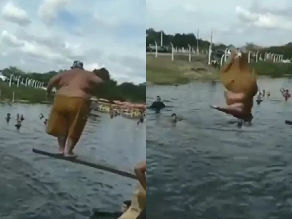 Pria dengan badan seperti pemain sumo salto dari atas kolam (Instagram/infomedanofficial)