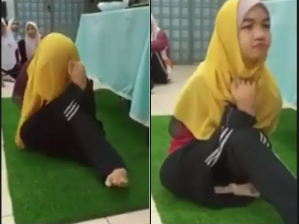 Cuplikan video saat wanita disabilitas menggunakan jilbab dengan kaki. (photo/TikTok/alfha98)