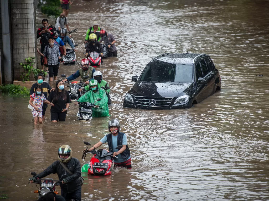 Banjir di Jakarta. (photo/ANTARA FOTO/Aprillio Akbar)