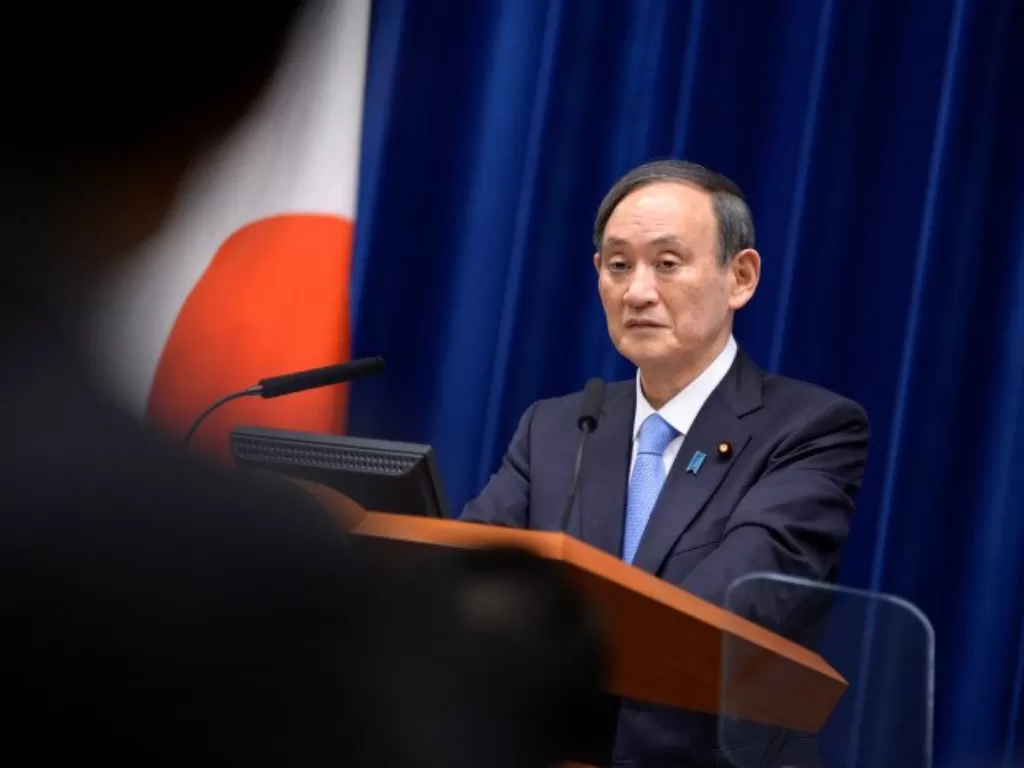  Arsip foto - Perdana Menteri Jepang Yoshihide Suga berbicara dalam sebuah konferensi pers di kediaman resmi PM di Tokyo, Jepang, 2 Februari 2021. (David Mareuil/Pool via REUTERS) 