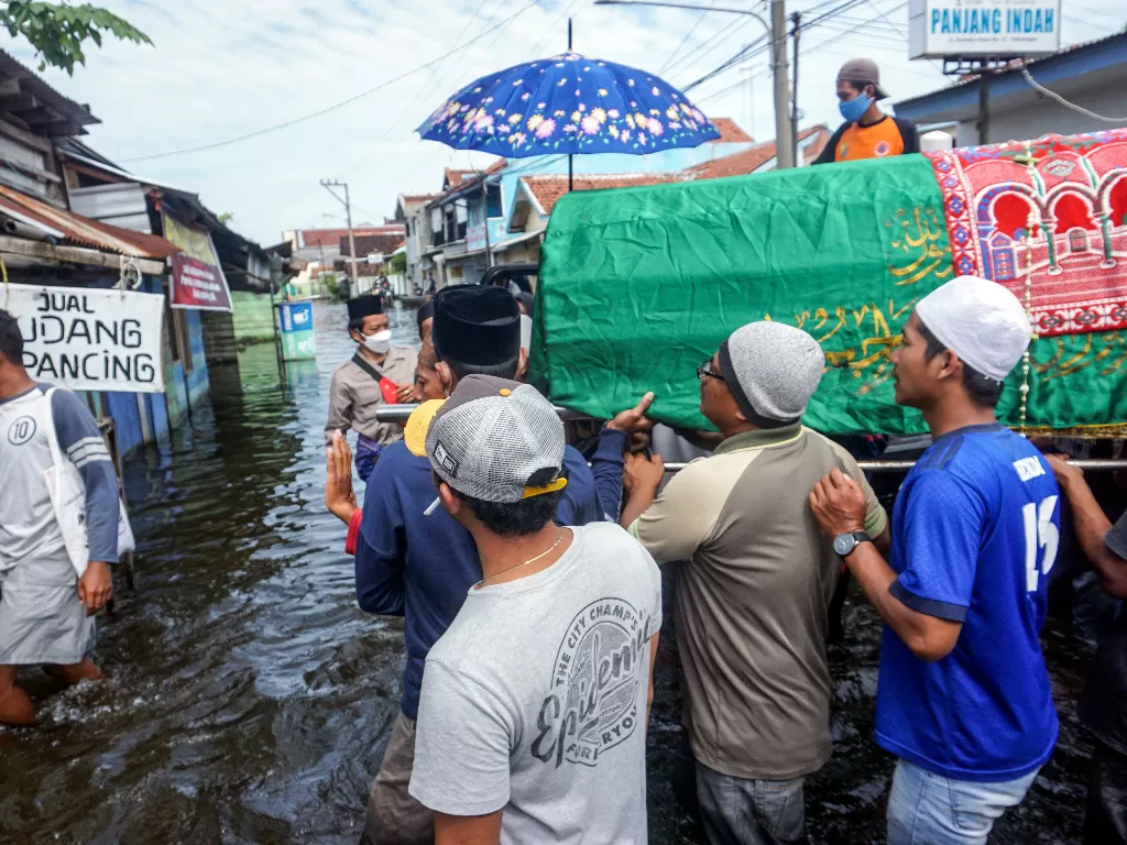 Foto ilustrasi meninggal saat banjir. (photo/Ilustrasi/ANTARA FOTO/Harviyan Perdana Putra)