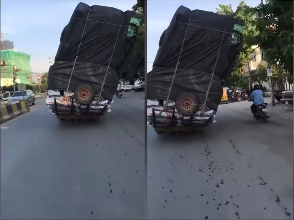 Cuplikan video truk yang miring tetap melaju. (photo/Youtube/ViralPress)
