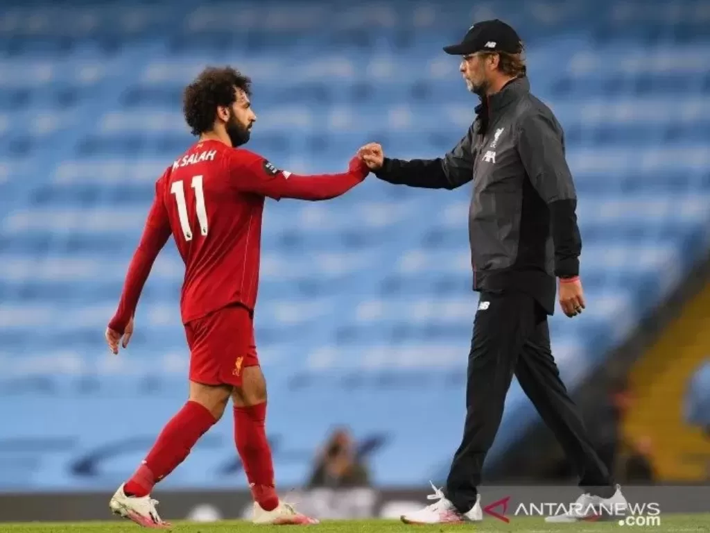 Mohamed Salah bersama Jurgen Klopp (ANTARA FOTO/Laurence Griffiths/Pool via REUTERS)
