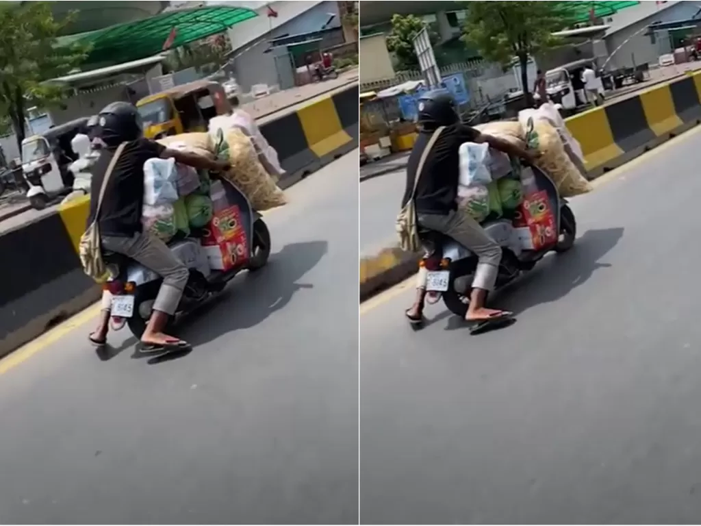 Pria ini nekat bawa barang banyak pakai sepeda motor (Screenshoot/YouTube/Viral Press)