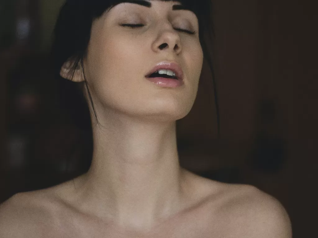 Ilustrasi wanita orgasme. (Photo by Valeria Boltneva from Pexels)