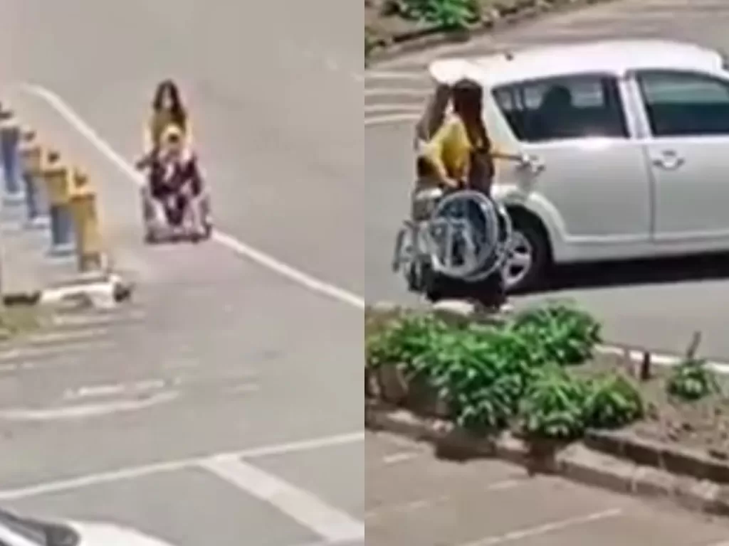 Seorang wanita membantu nenek yang duduk di kursi roda. (Photo/Facebook/Info Roadblock JPJ/POLIS)