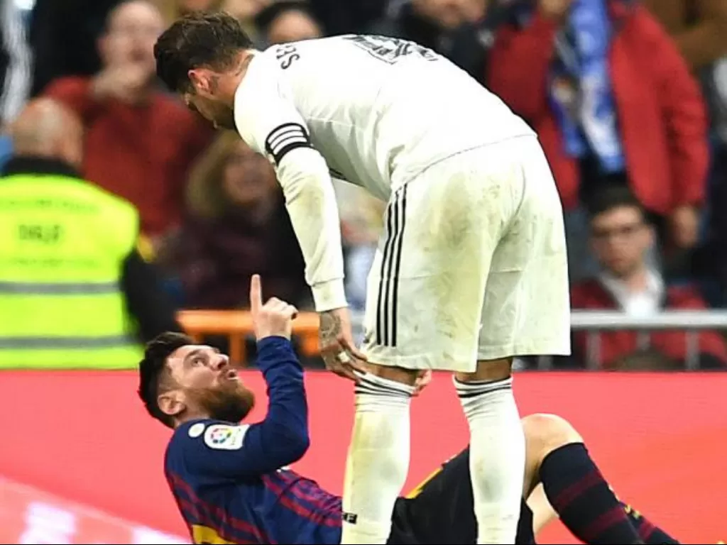 Sergio Ramos dan Lionel Messi. (REUTERS/Sergio Perez)
