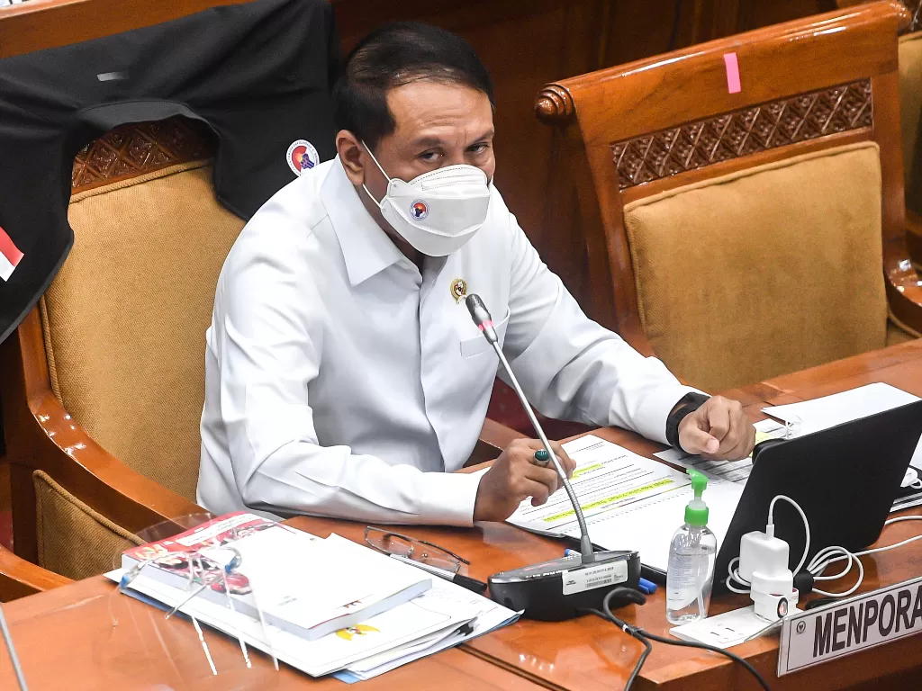 Menteri Pemuda dan Olahraga Zainudin Amali  saat mengikuti rapat kerja dengan Komisi X DPR di komplek Parlemen Senayan, Jakarta, Selasa (23/3/2021).  (photo/ANTARA FOTO/Muhammad Adimaja)