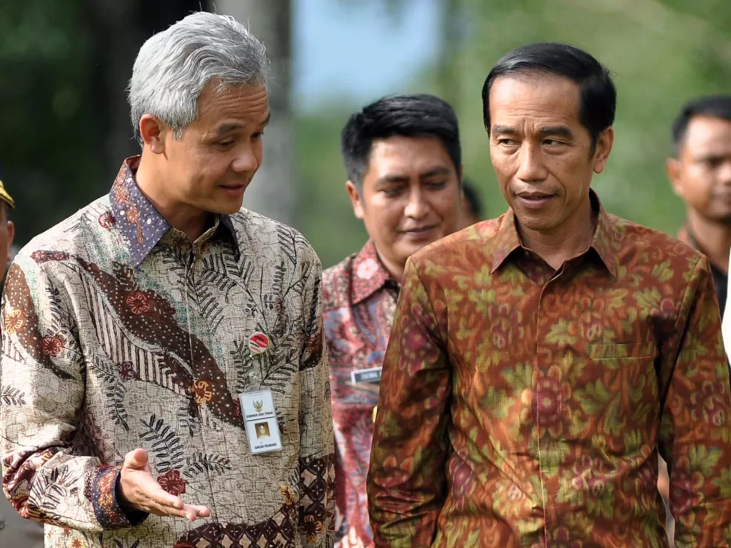 Presiden Jokowi dan Gubernur Jawa Tengah, Ganjar Pranowo. (photo/ANTARA FOTO/Anis Efizudin)