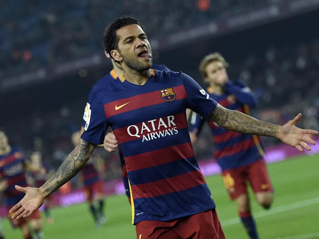 Dani Alves akui tak menyesal cabut dari Barcelona. (photo/REUTERS/Juan Medina)