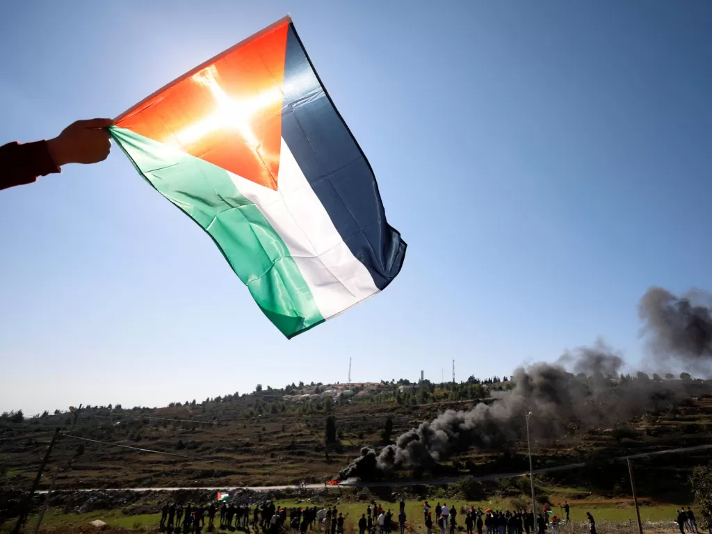 Bendera Palestina. (photo/Ilustrasi/REUTERS/Mohamad Torokman)