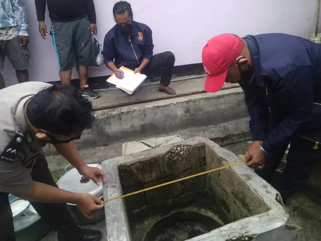 Sumur tempat jasad pria ditemukan di Papua. (Dok. Humas Polda Papua)
