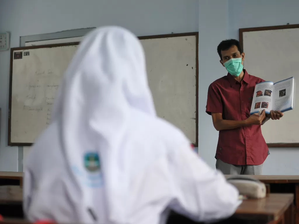 Ilustrasi - Proses pembelajaran tatap muka (PTM) di SMA Negeri 3 Kabupaten Jombang, Jawa Timur, Selasa (6/4/2021). (ANTARA/Syaiful Arif)