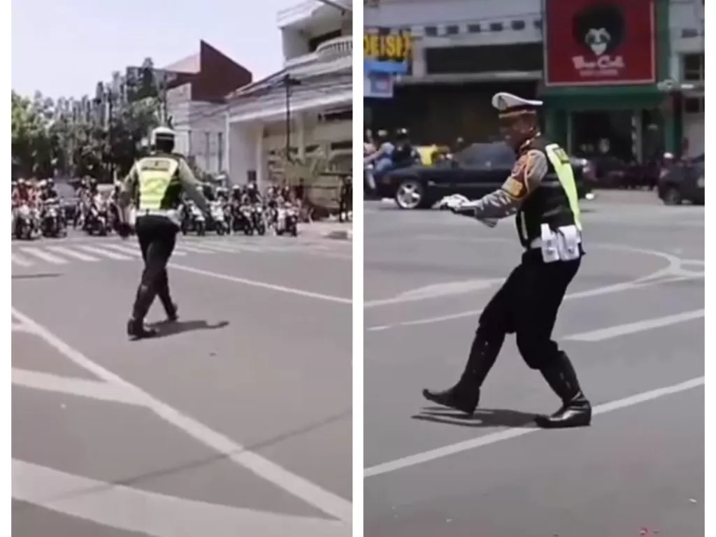 Viral video polisi joget tiktok di persimpangan lampu merah. (TikTok/@bohimofficial)