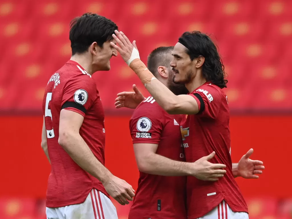 Para pemain Manchester United merayakan gol. (REUTERS/Gareth Copley)