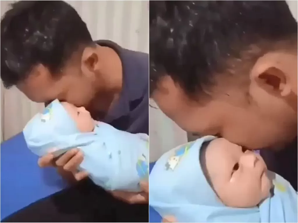 Serda Kom Purwanto saat mengazankan bayi perempuannya yang baru lahir (Instagram/tnilovers18)