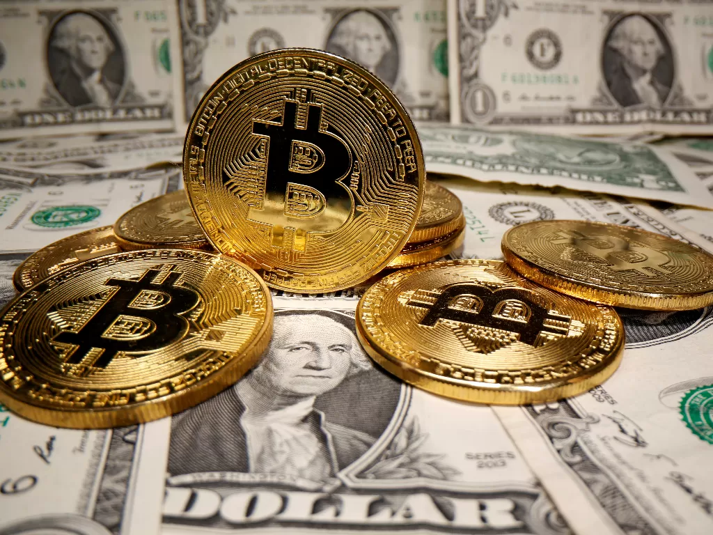 Ilustrasi bitcoin yang jadi mata uang kripto(REUTERS/Dado Ruvic/File Photo)
