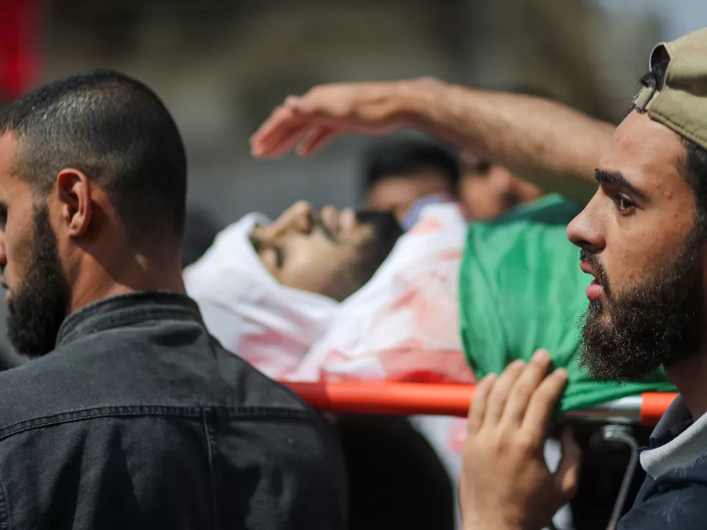 Warga sipil Palestina yang terbunuh karena serangan Israel. (REUTERS/Mohammed Salem)