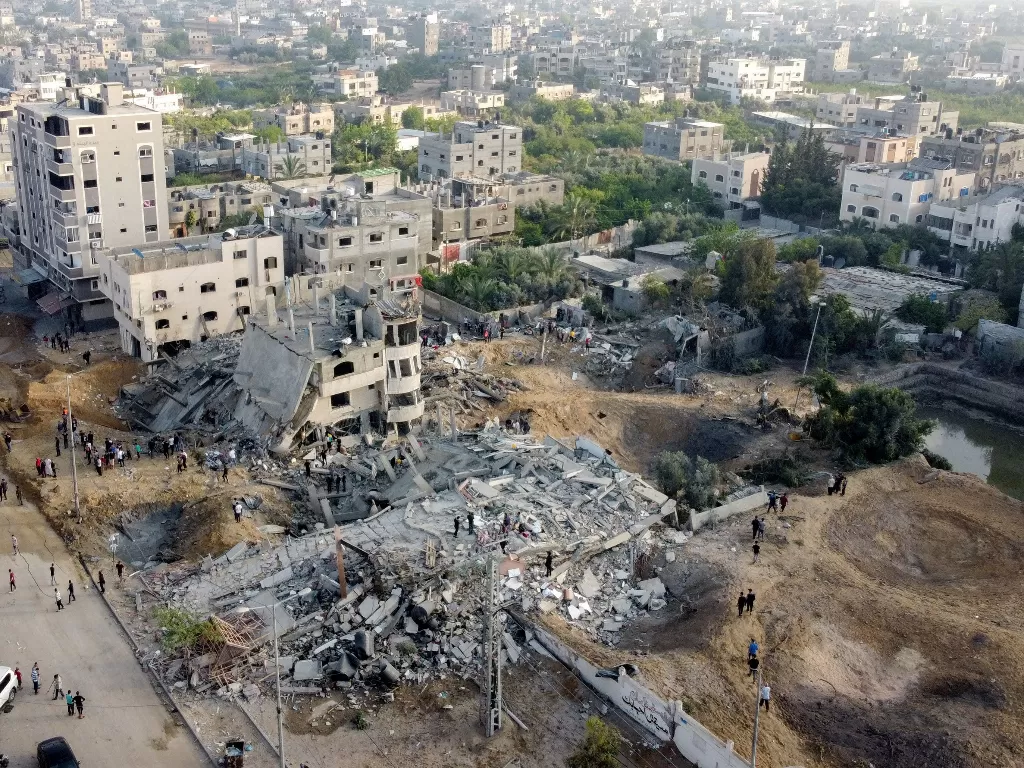 Bangunan rata dengan tanah karena serangan Israel (REUTERS/Mohammed Salem)