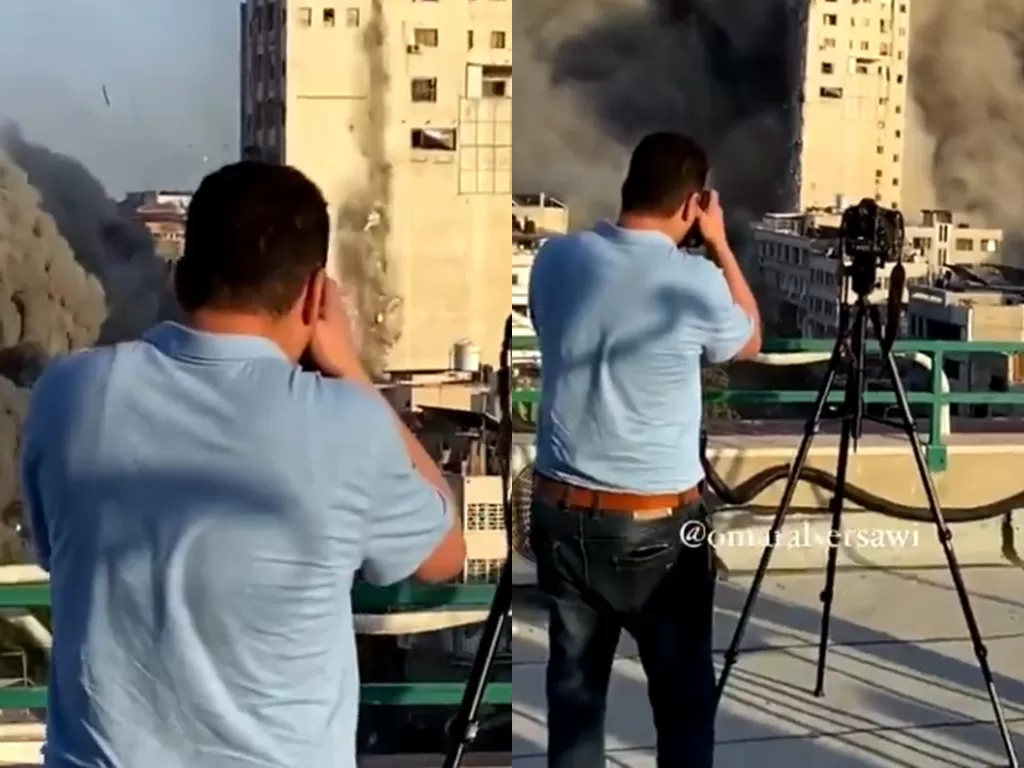 Juru Kamera yang berada di tengah-tengah serangan udara Israel terhadap dua bangunan di Gaza. (Photo/Twitter/@aflchambers)