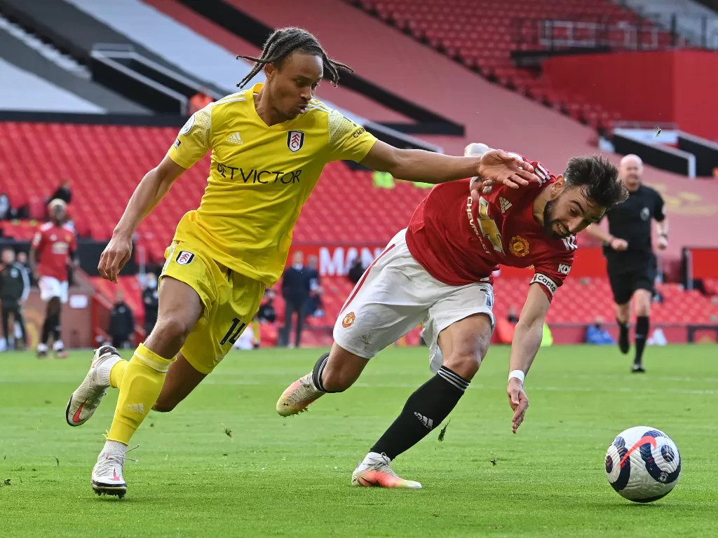 Manchester United vs Fulham. (photo/REUTERS/Paul Ellis)