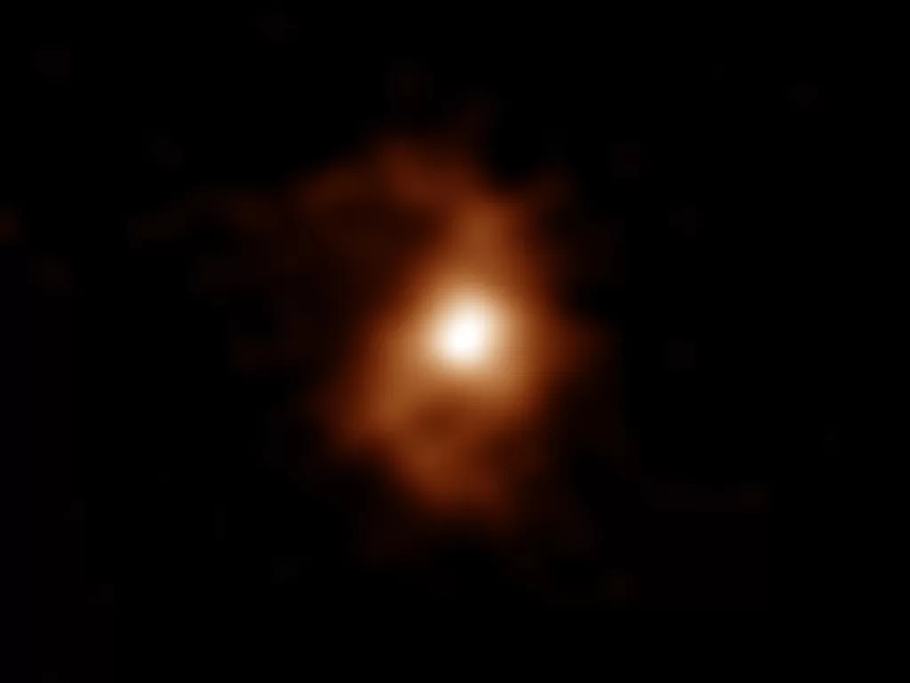 Galaksi tertua BRI 1335-0417. (photo/ALMA/ESO/NAOJ/NRAO/T. Tsukui & S. Iguchi)