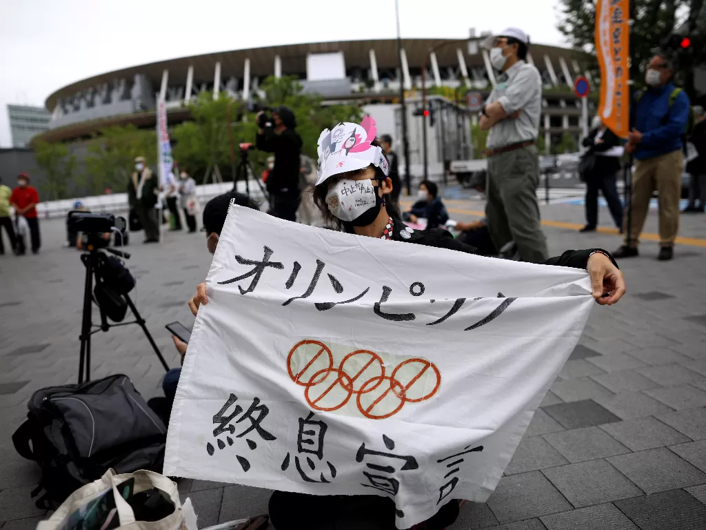 Protes menentang Olimpiade Tokyo (REUTERS/Issei Kato).