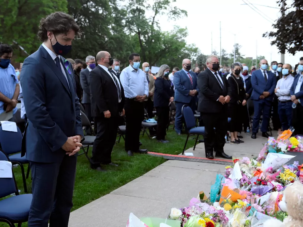 PM Kanada Justin Trudeau hadir dalam acara mengenang keluarga muslim yang dibunuh sopir truk (Nathan Denette/Pool via REUTERS)