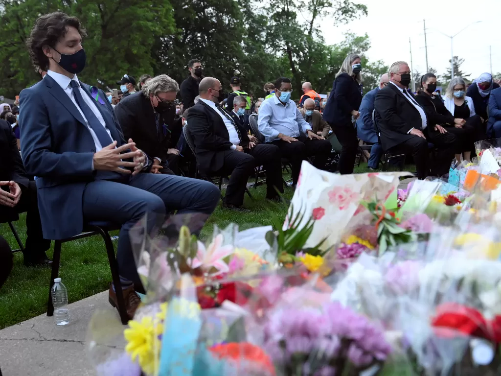 Justin Trudeau saat menghadiri acara mengenang keluarga muslim yang dibunuh (Nathan Denette/Pool via REUTERS)