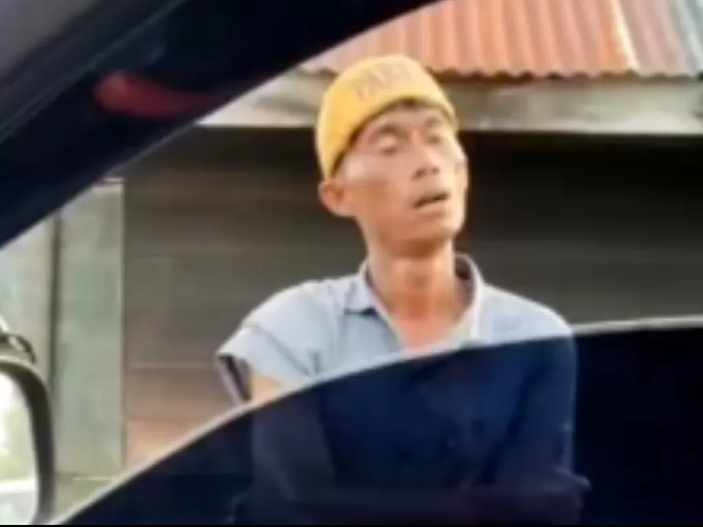 Preman menyaru tukang parkir memalak pengunjung di Percut Sei Tuan, Deliserdang. (ist)