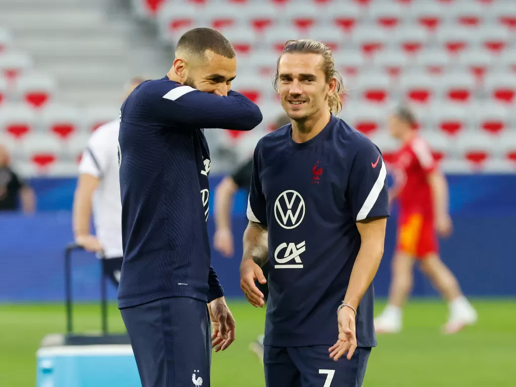 Karim Benzema dan Antoine Griezmann. (photo/REUTERS/Eric Gaillard)
