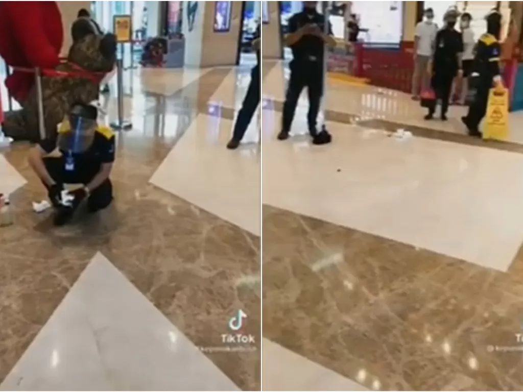 Screenshot video petugas membersihkan kotoran anjing yang berceceran (TikTok/keponakanbush)