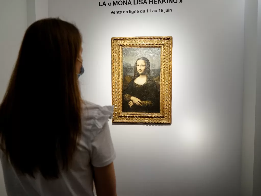 Lukisan tiruan Mona Lisa (REUTERS/Lucien Libert)