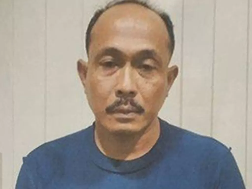 Aipda Rony Syahputra (45) oknum polisi anggota Polres Pelabuhan Belawan terdakwa pembunuhan. (Ist)
