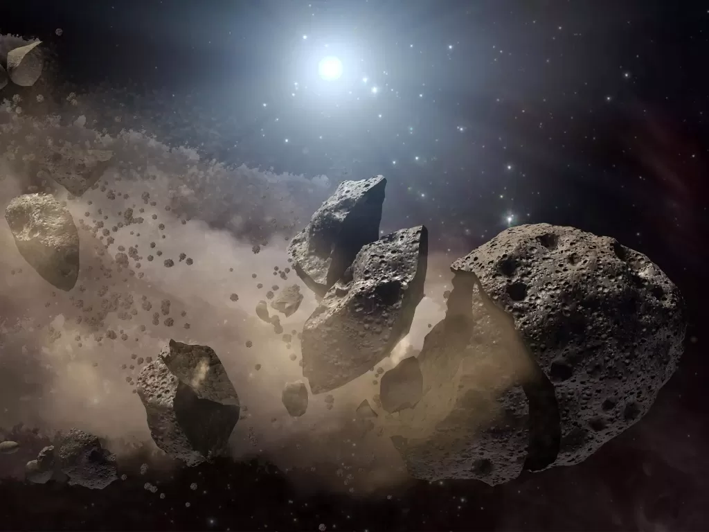Ilustrasi asteroid yang pecah di luar angkasa (photo/NASA/JPL-Caltech)