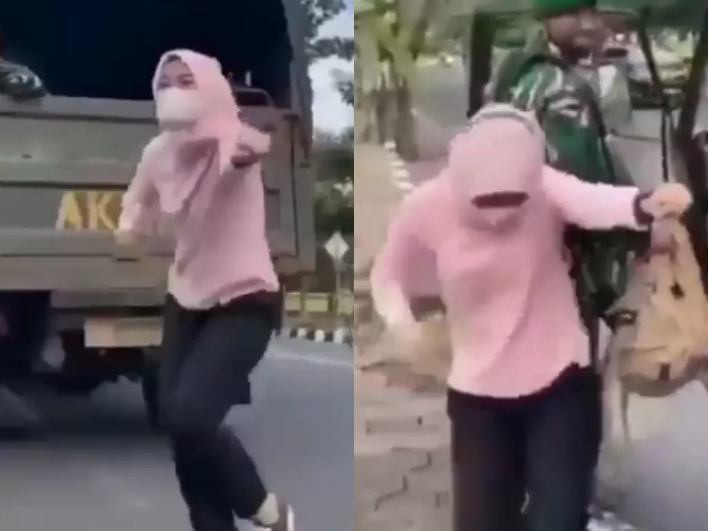 Viral wanita berhijab joget tak jelas di depan prajurit TNI. (Photo/Instagram/@jayalah.negriku)