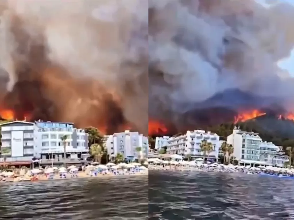 Kebakaran hutan hebat di kawasan kota wisata Manavgat, Provinsi Antalya, pesisir Mediterania Turki, Kamis (29/7/2021). (Tangkapan layar/Twitter)