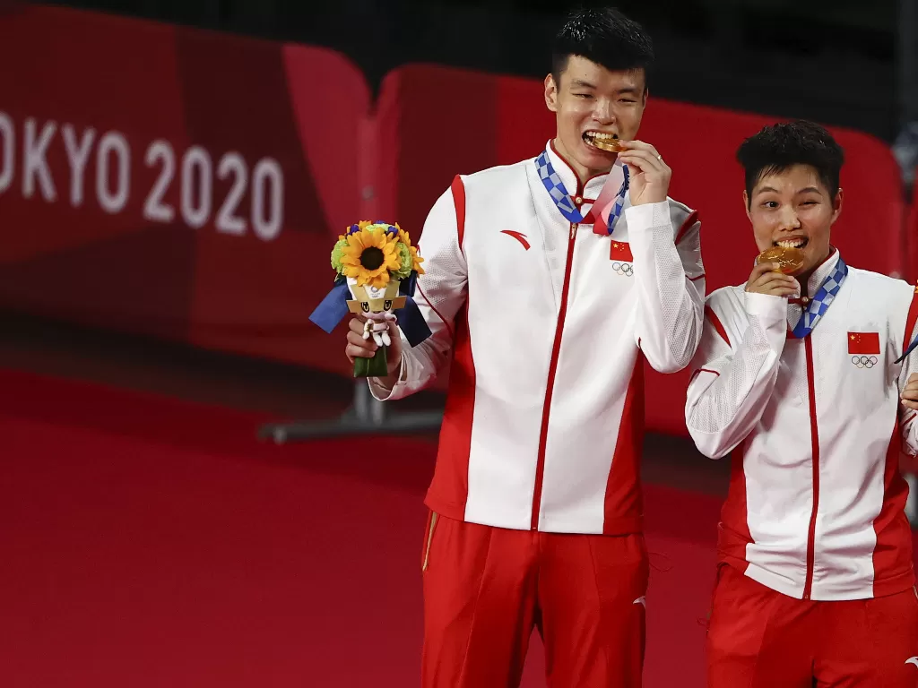Wang Yilyu/Huang Dongping raih emas Olimpiade Tokyo 2020 (REUTERS/Hamad I Mohammed)