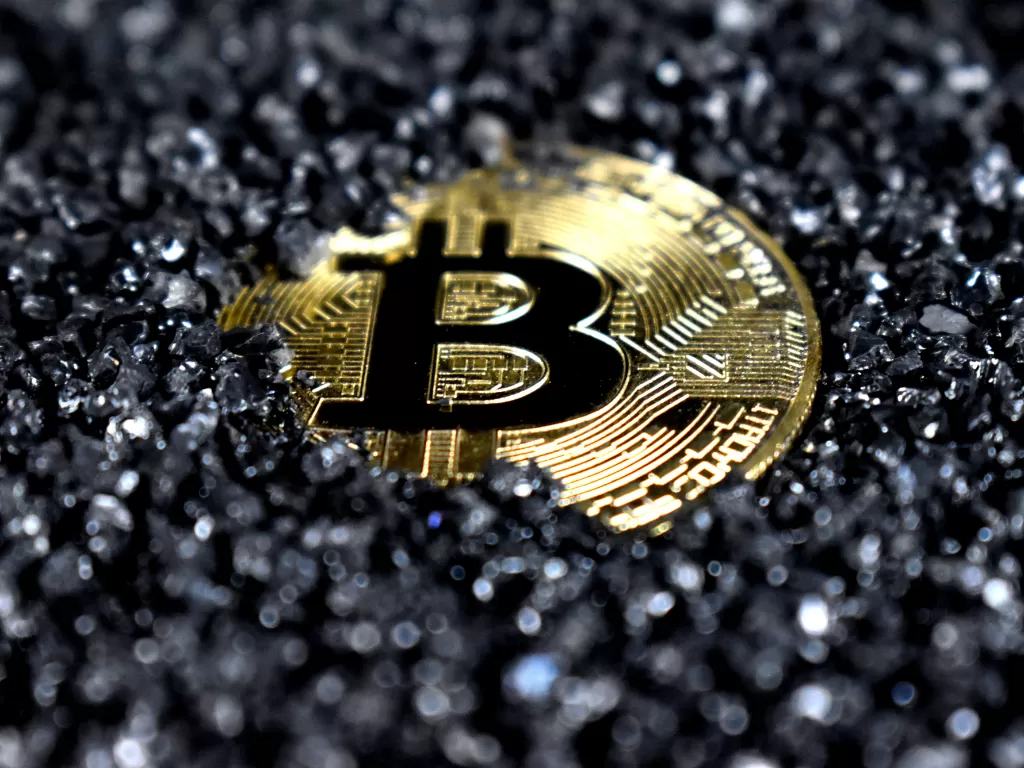 Ilustrasi mata uang kripto Bitcoin (Ilustrasi/Unsplash/Executium)