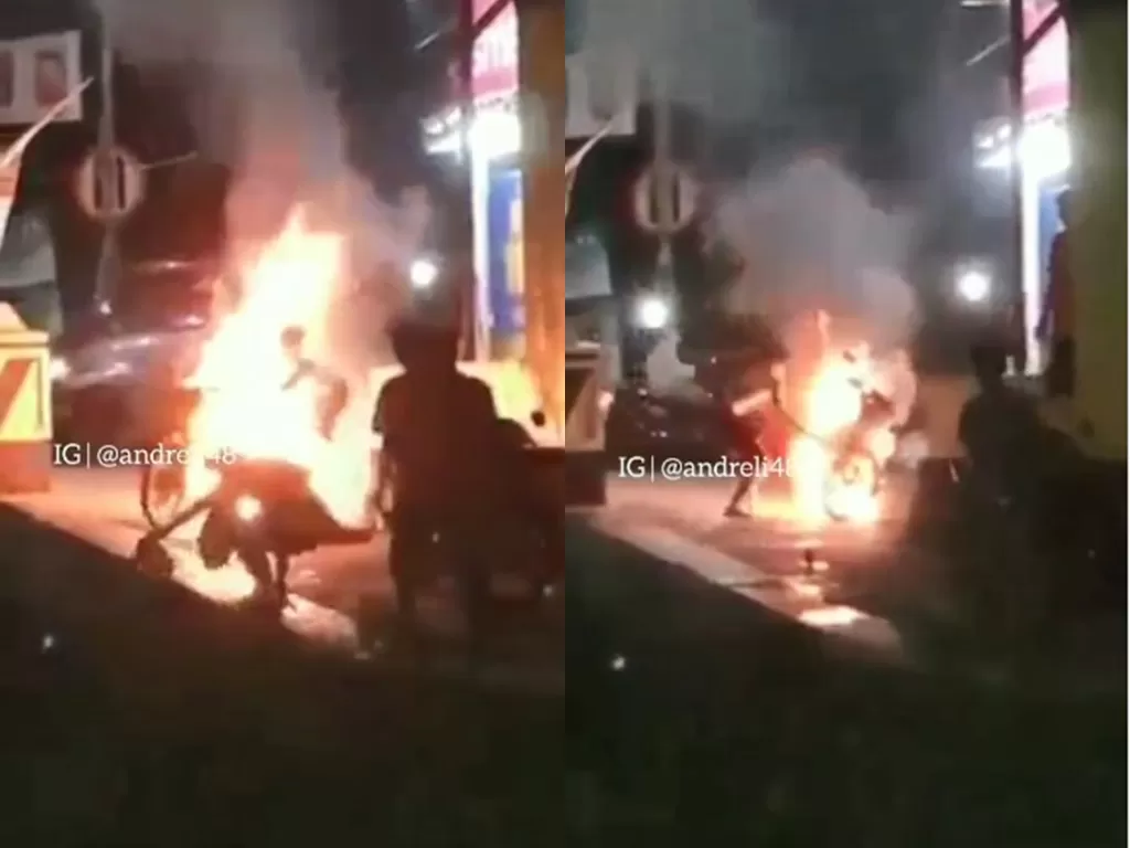 Aksi heroik pemuda dorong sepeda motor yang terbakar (Instagram/andreli48)