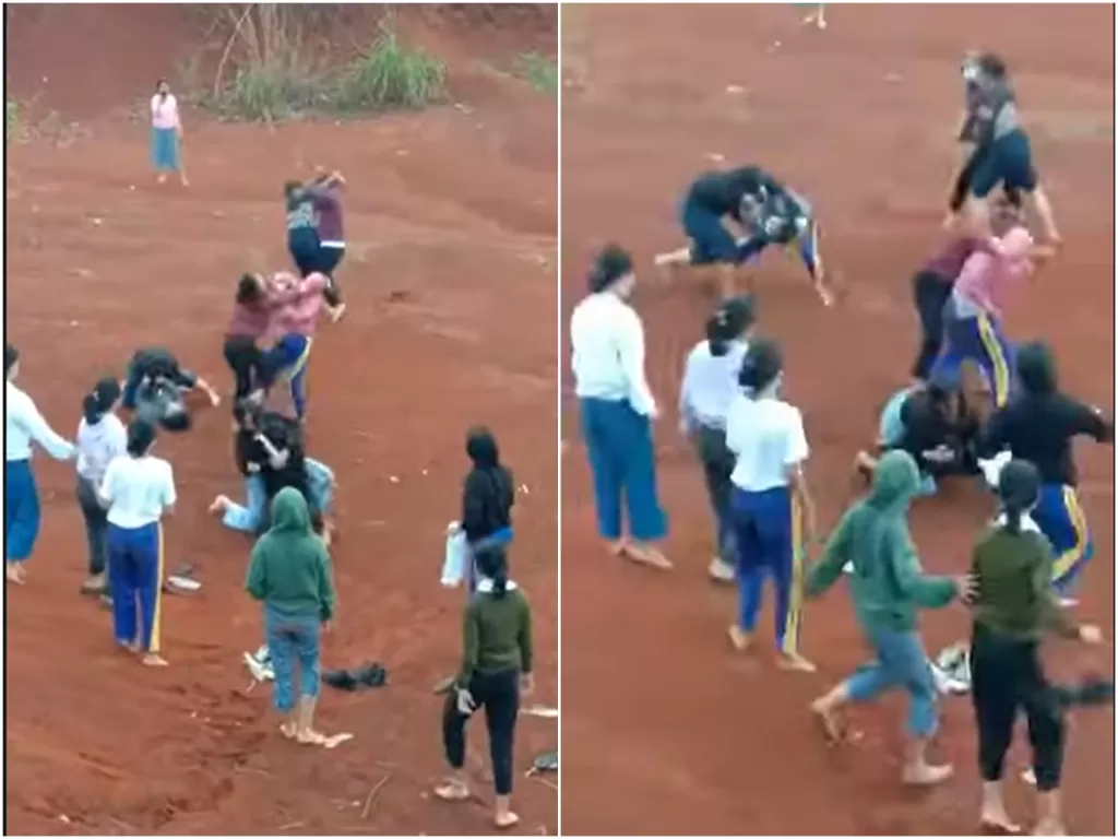 Cuplikan video viral perempuan baku hantam di lapangan. (photo/Istimewa)